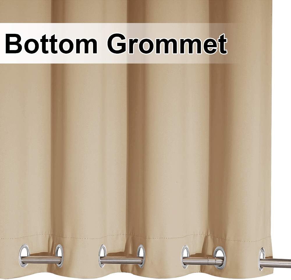 Close-up of a beige curtain panel featuring silver bottom grommets on a metal rod.