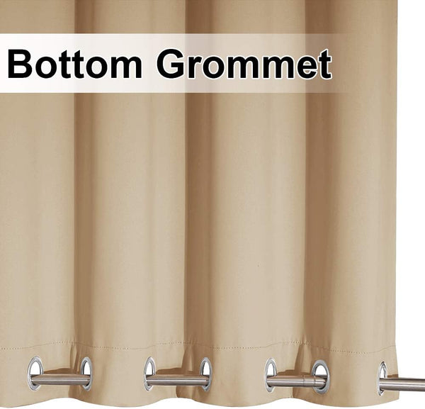 Close-up of a beige curtain panel featuring silver bottom grommets on a metal rod.