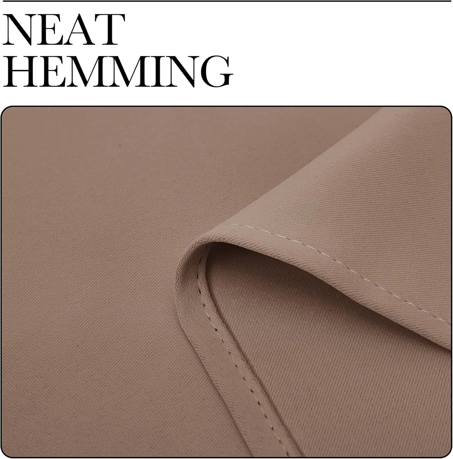 Close-up of beige curtain fabric showing neat hemming and stitched edge detail