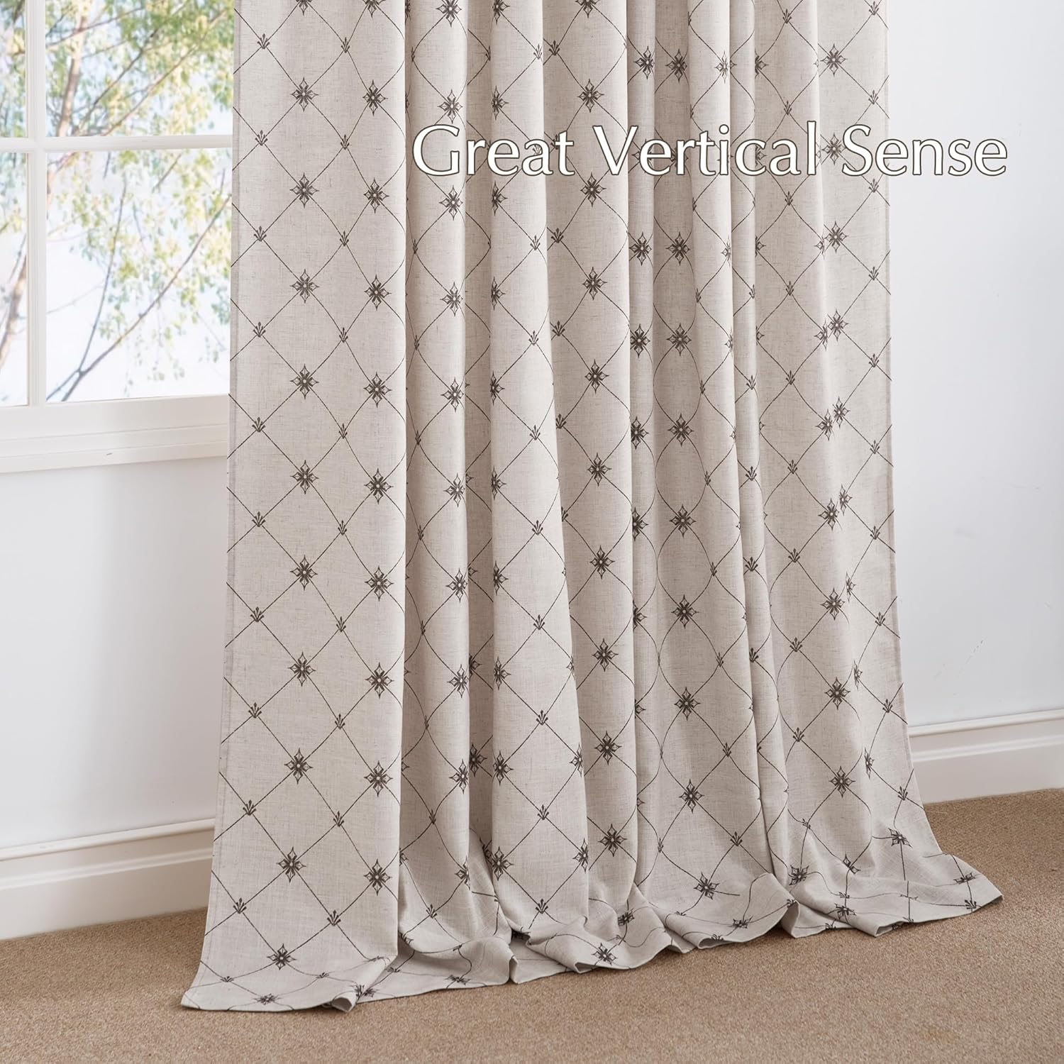 Beige textured curtain featuring a dark brown geometric diamond pattern with star accents, drapes on floor.