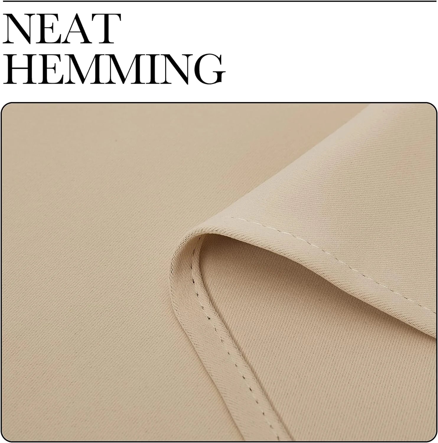 Close-up of beige fabric with neatly stitched hem and smooth woven texture