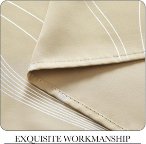 Detailed view of beige woven fabric featuring subtle white arcing stripes and a precisely sewn hem.