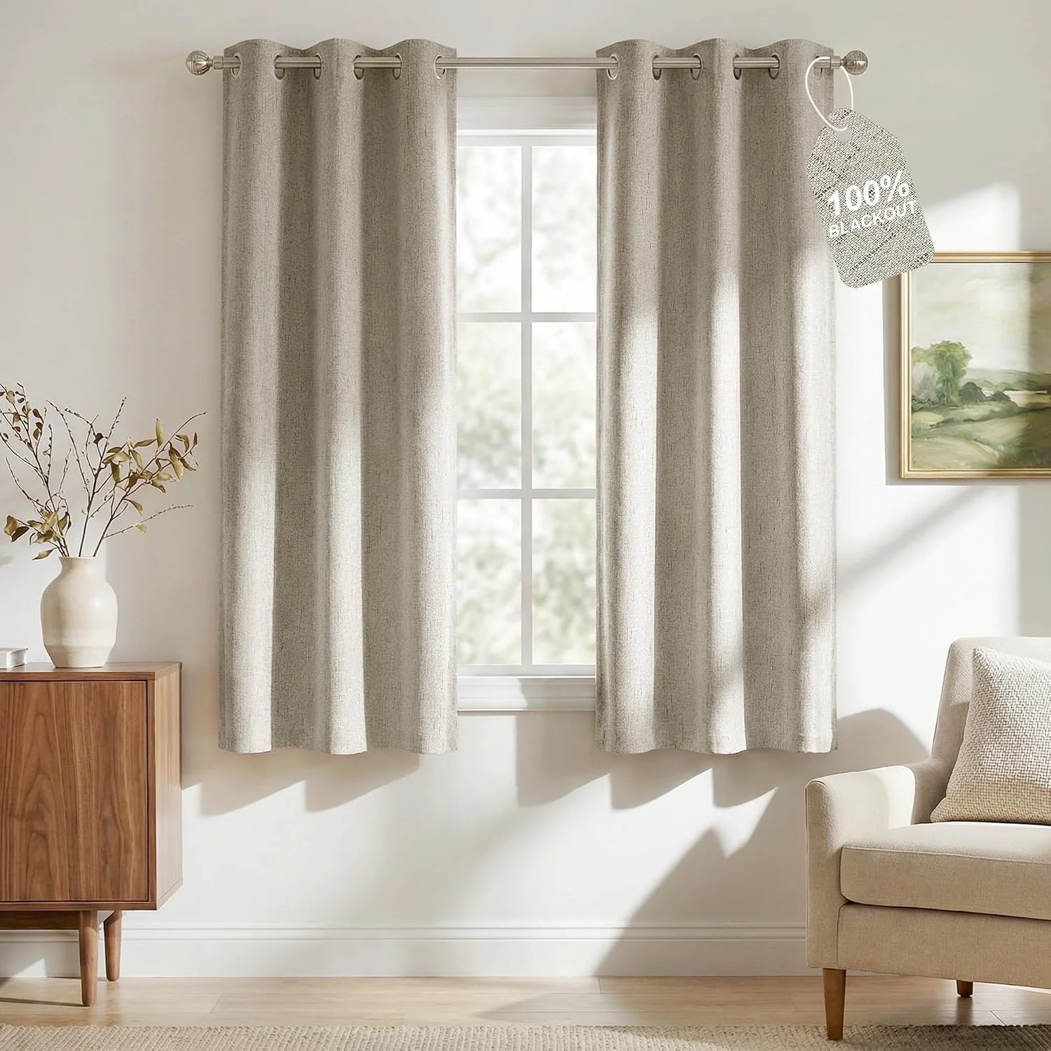 Beige textured blackout curtains with grommet top in a bright modern living room