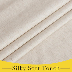Close-up of light beige linen-look fabric with a textured weave, elegantly draped to show its silky soft feel.