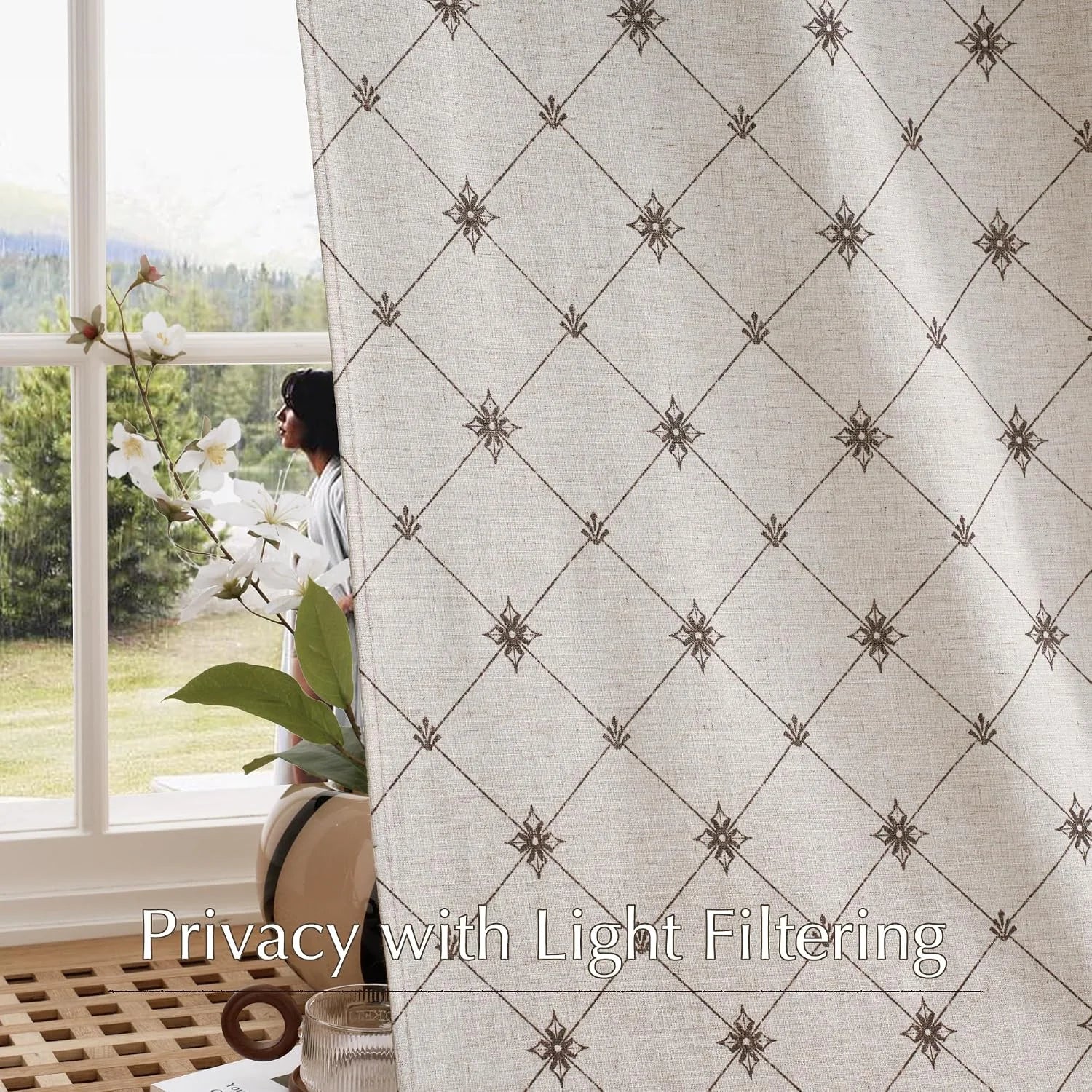 Beige linen curtain with brown geometric lattice print beside a bright window