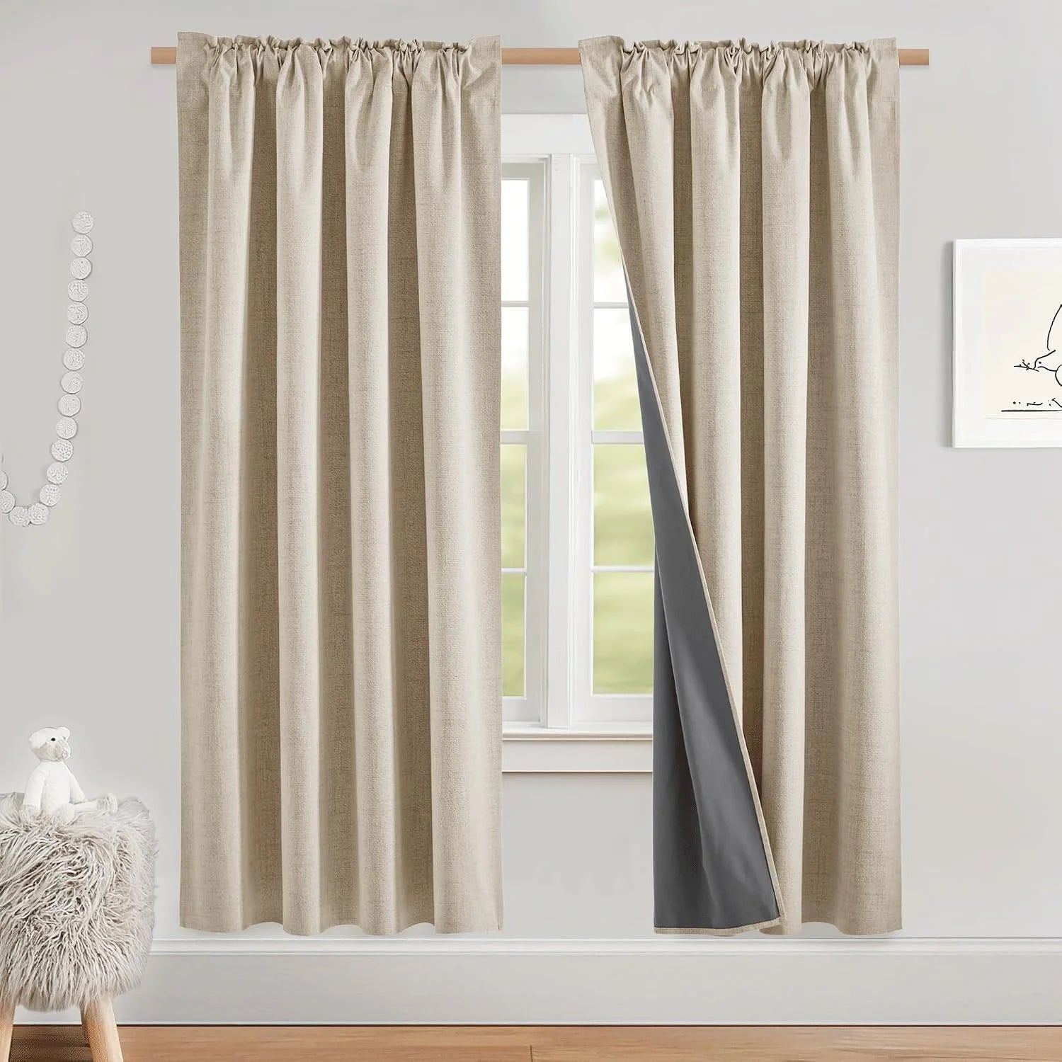 Beige linen-look blackout curtains with rod pocket header in a light neutral room