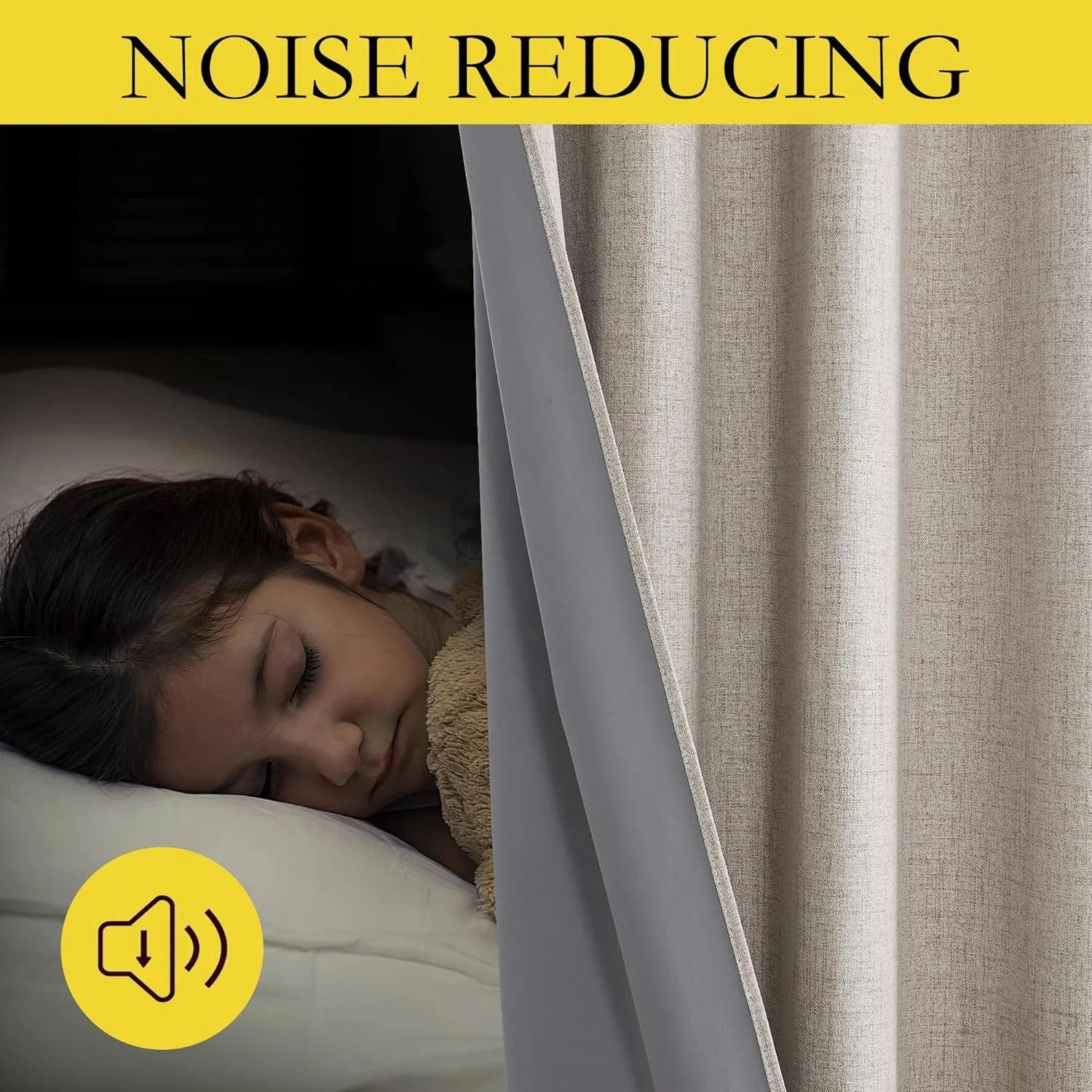 Beige linen-look noise reducing curtain beside a sleeping child in a dark bedroom