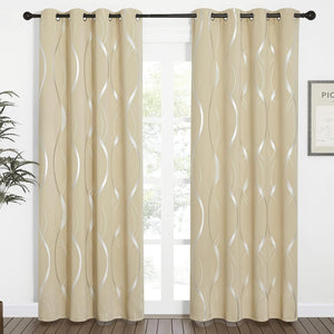 A pair of beige grommet top curtains with an elegant silver metallic wavy pattern hanging on a dark rod.