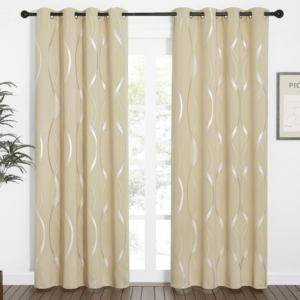 A pair of beige grommet top curtains with an elegant silver metallic wavy pattern hanging on a dark rod.