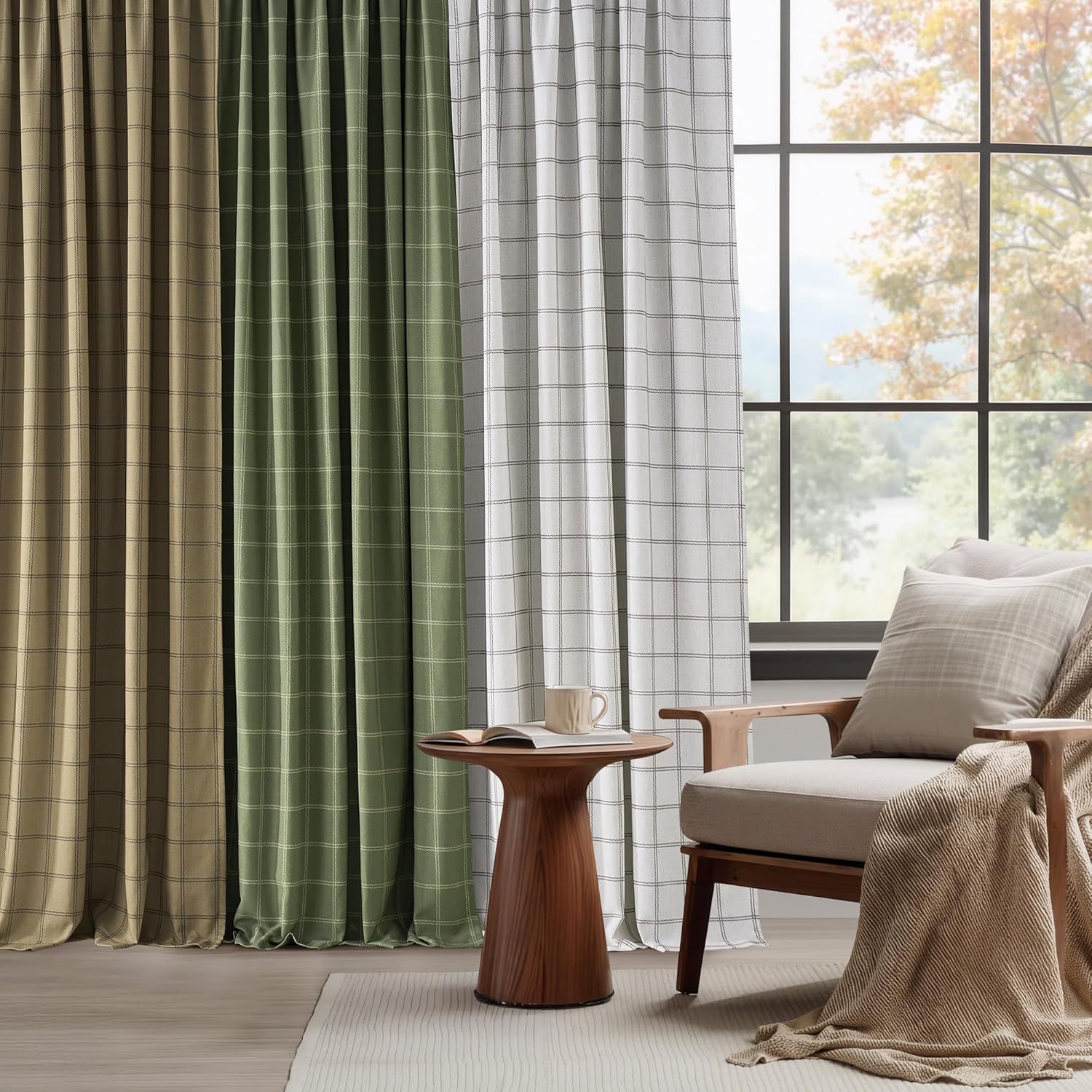 Three pleated plaid window curtains in beige, olive green, and white shades hanging in a cozy living room.