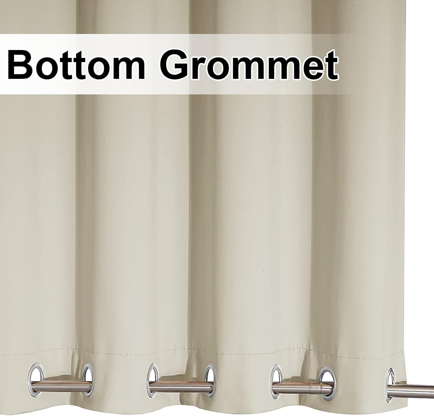 Light beige opaque curtain with silver bottom grommets and a metal rod threaded through.