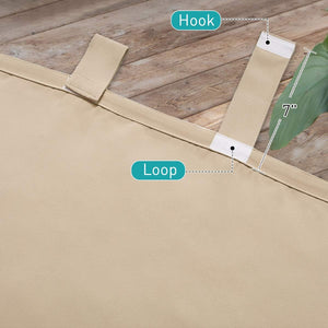Beige outdoor fabric detail, showcasing a 7-inch tab with hook-and-loop fasteners.