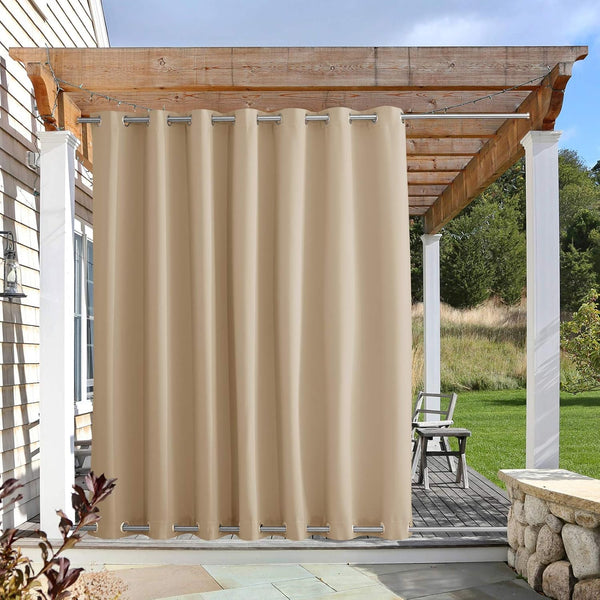 Beige outdoor grommet curtain on a patio pergola, with top and bottom rods, providing privacy.