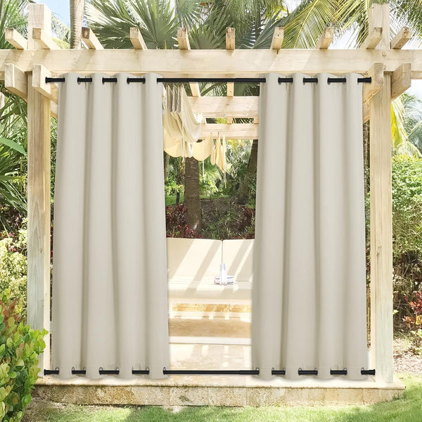 Beige outdoor patio curtains with top and bottom black grommets hanging from a wooden pergola.