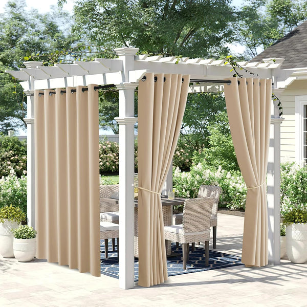 Beige outdoor curtains with black grommet tops on a white pergola, shading a patio dining set.