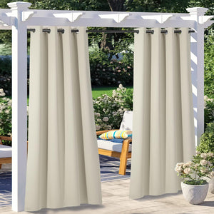 Pair of light beige outdoor patio curtains with black grommet tops on a white pergola, offering privacy.