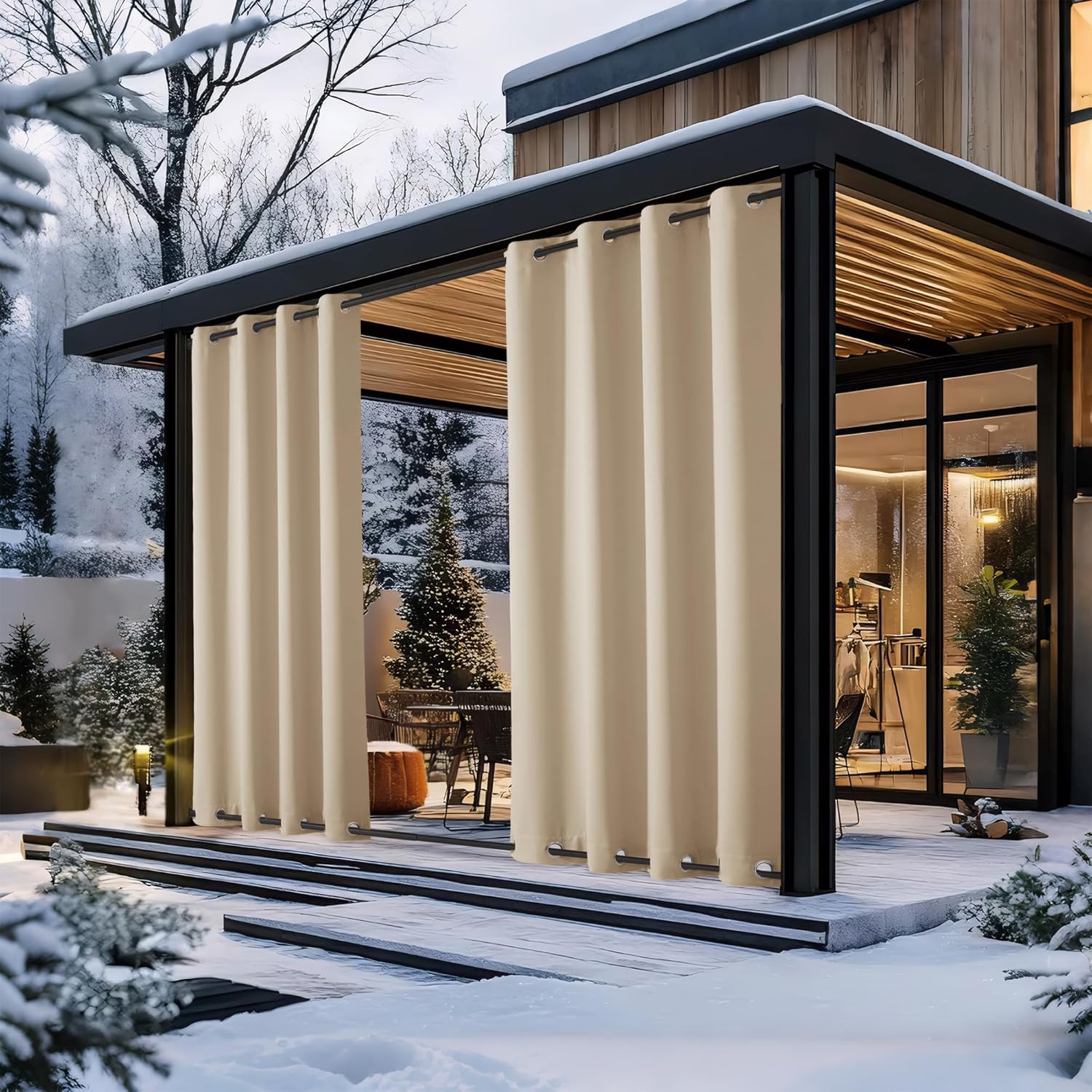 Beige outdoor grommet top curtains installed on a pergola, offering privacy for a patio dining area during winter.