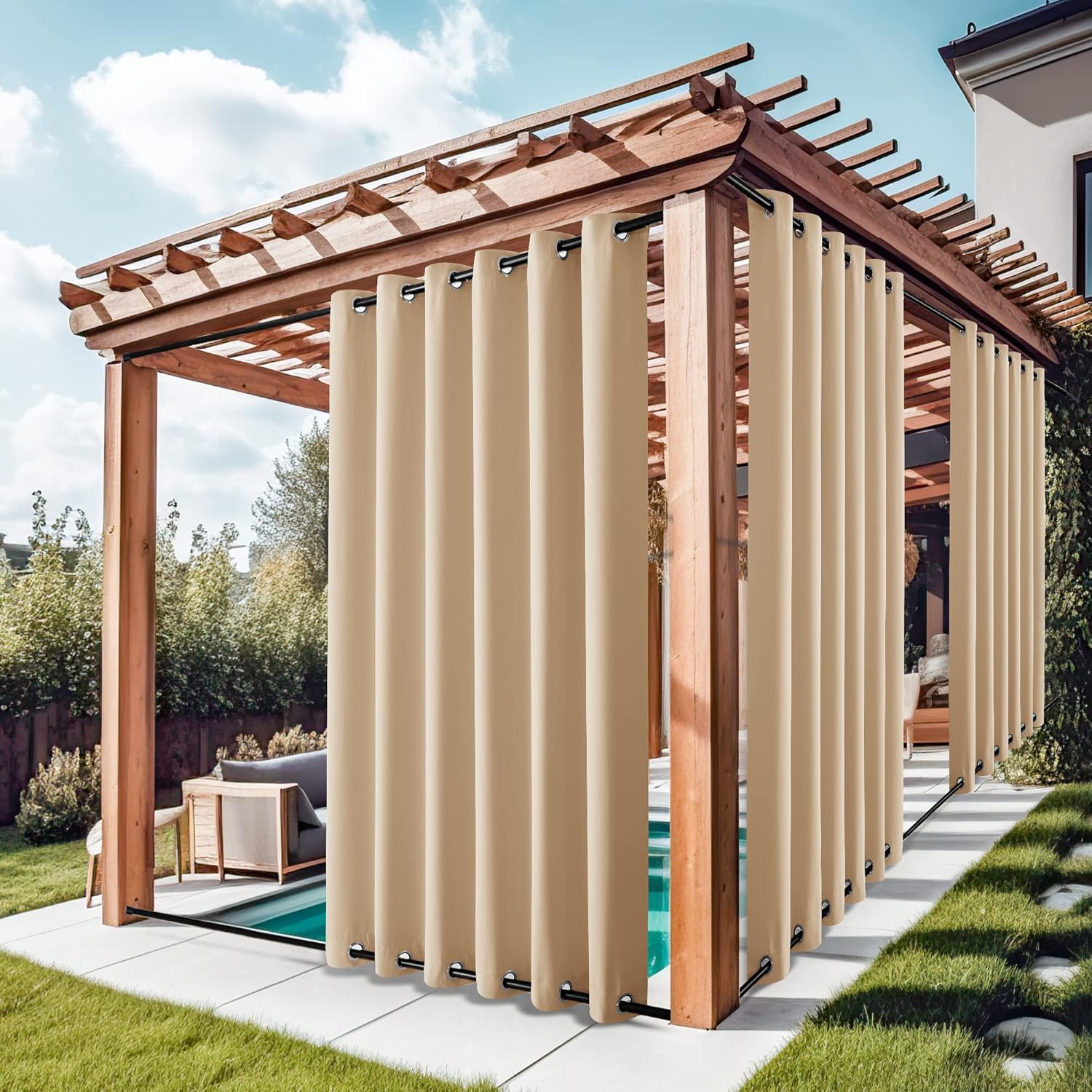 Beige outdoor privacy curtains with black grommets on top and bottom rods enclosing a wooden pergola by a pool.