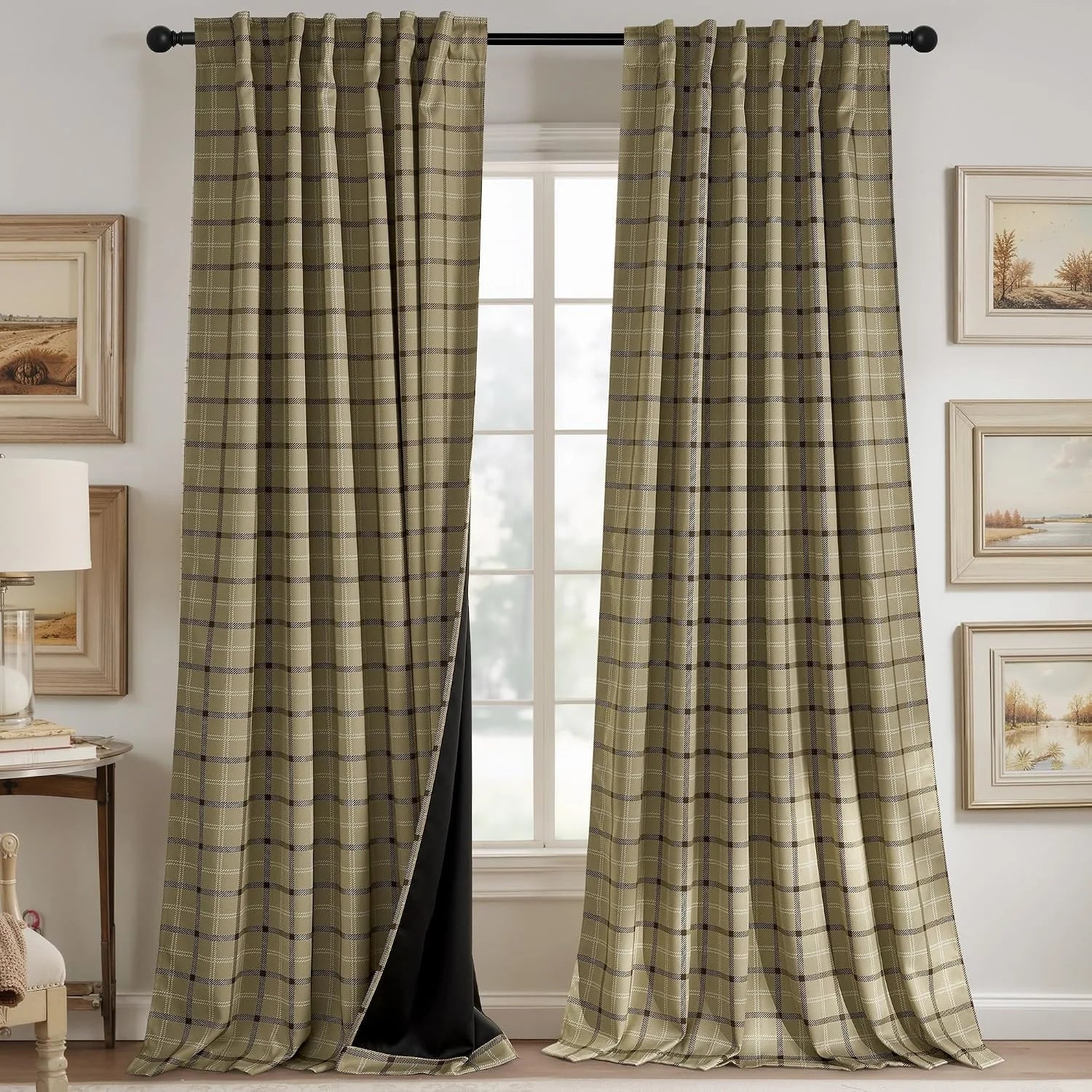 Beige plaid blackout curtains on a black rod in a cozy traditional room