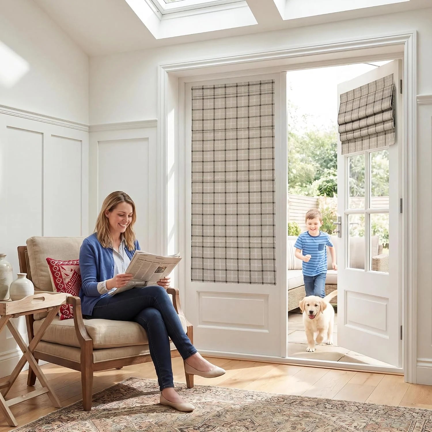 Beige plaid Roman blind on a glazed patio door in a bright modern sitting room