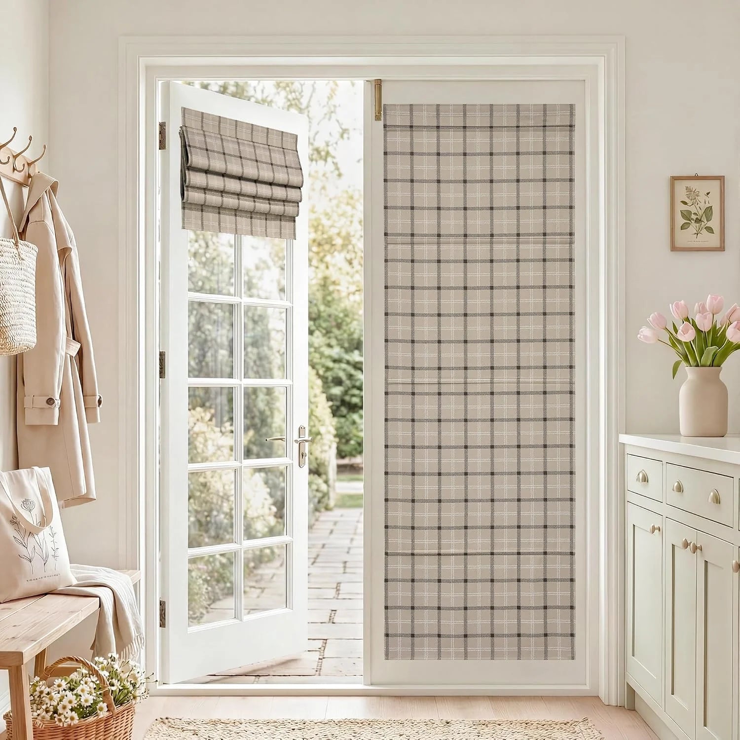Beige plaid Roman shades on a glass patio door in a bright neutral entryway