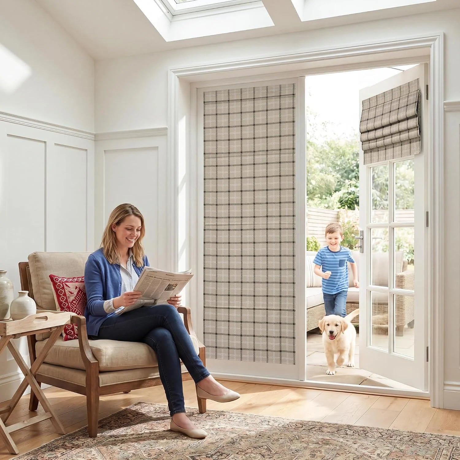 Beige plaid Roman shades on patio doors in a bright sitting room with child and dog
