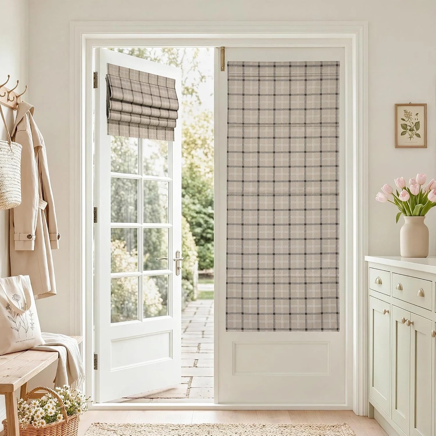 Beige plaid Roman shade mounted on a white glass entry door in a bright hallway