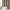 Textured beige window curtain panel with brown and white plaid pattern