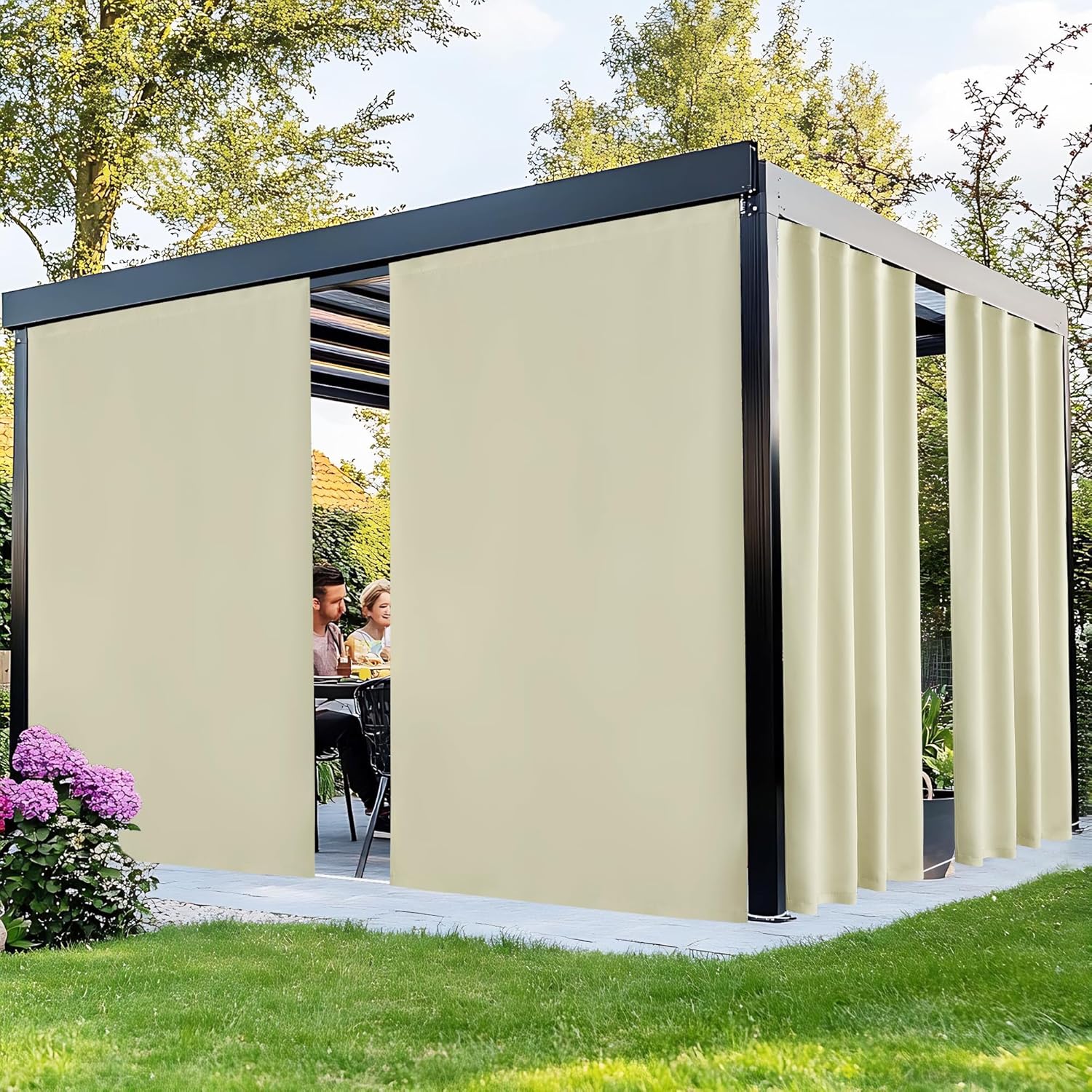 Beige retractable privacy curtains on a black metal pergola, providing shade for outdoor patio dining.