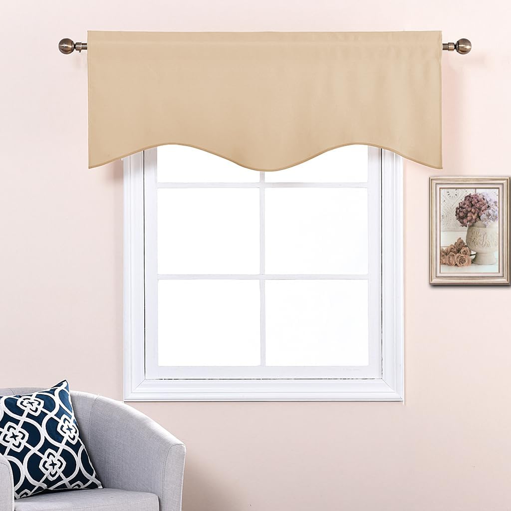 Beige scalloped window valance hangs on a metal rod above a white window frame.