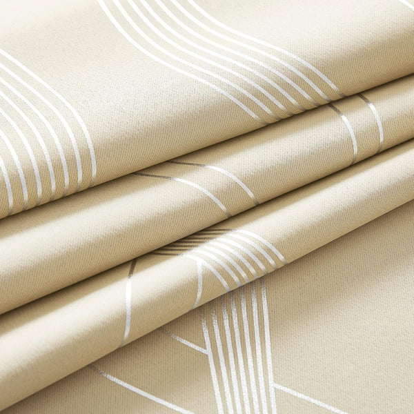 Close-up of beige textured fabric with modern silver geometric curved line pattern.