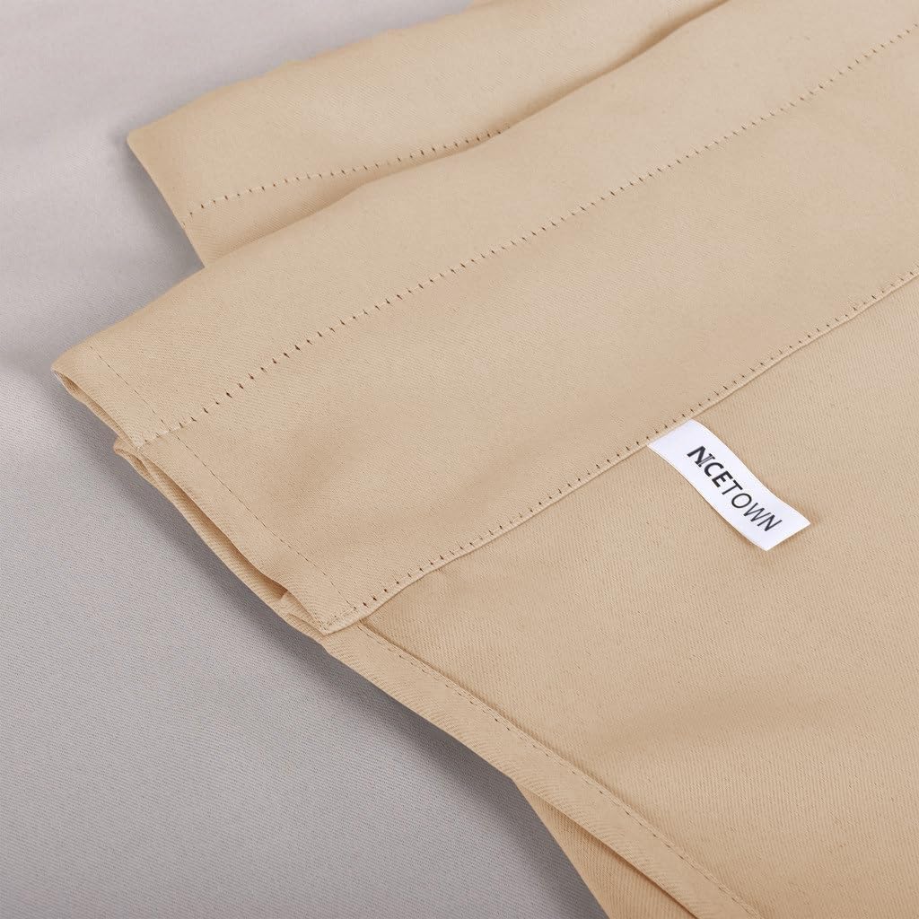 Close-up of a light beige smooth curtain header with visible stitching and a white 'NCETOWN' brand label.