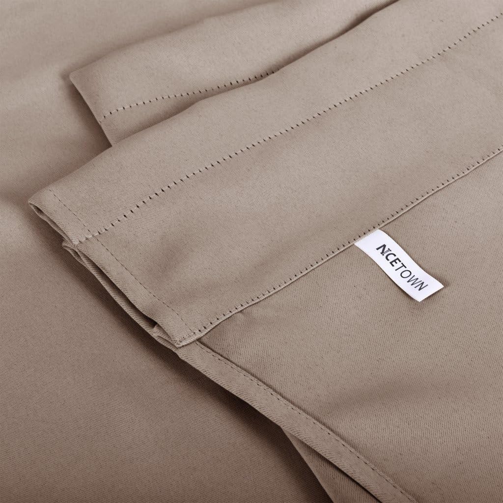Close-up of beige taupe matte fabric with visible top stitching, showing NCETOWN brand tag.