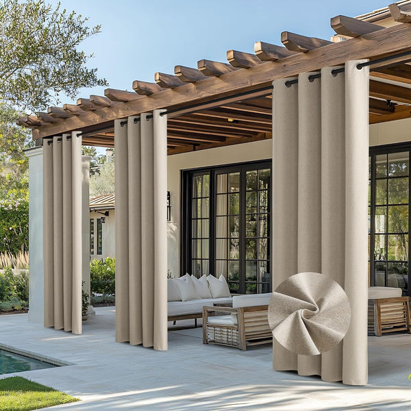 Beige textured outdoor curtains with grommet tops on a wooden pergola, shading a sunny patio.