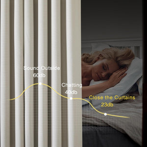 Light beige textured curtains reduce sound from 60db to 23db, enabling a woman to sleep peacefully.