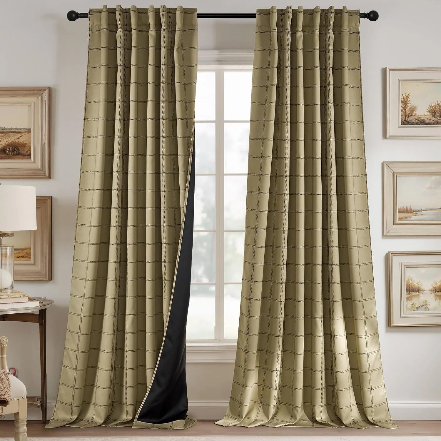 Beige windowpane blackout curtains with pleated top hanging in a traditional room