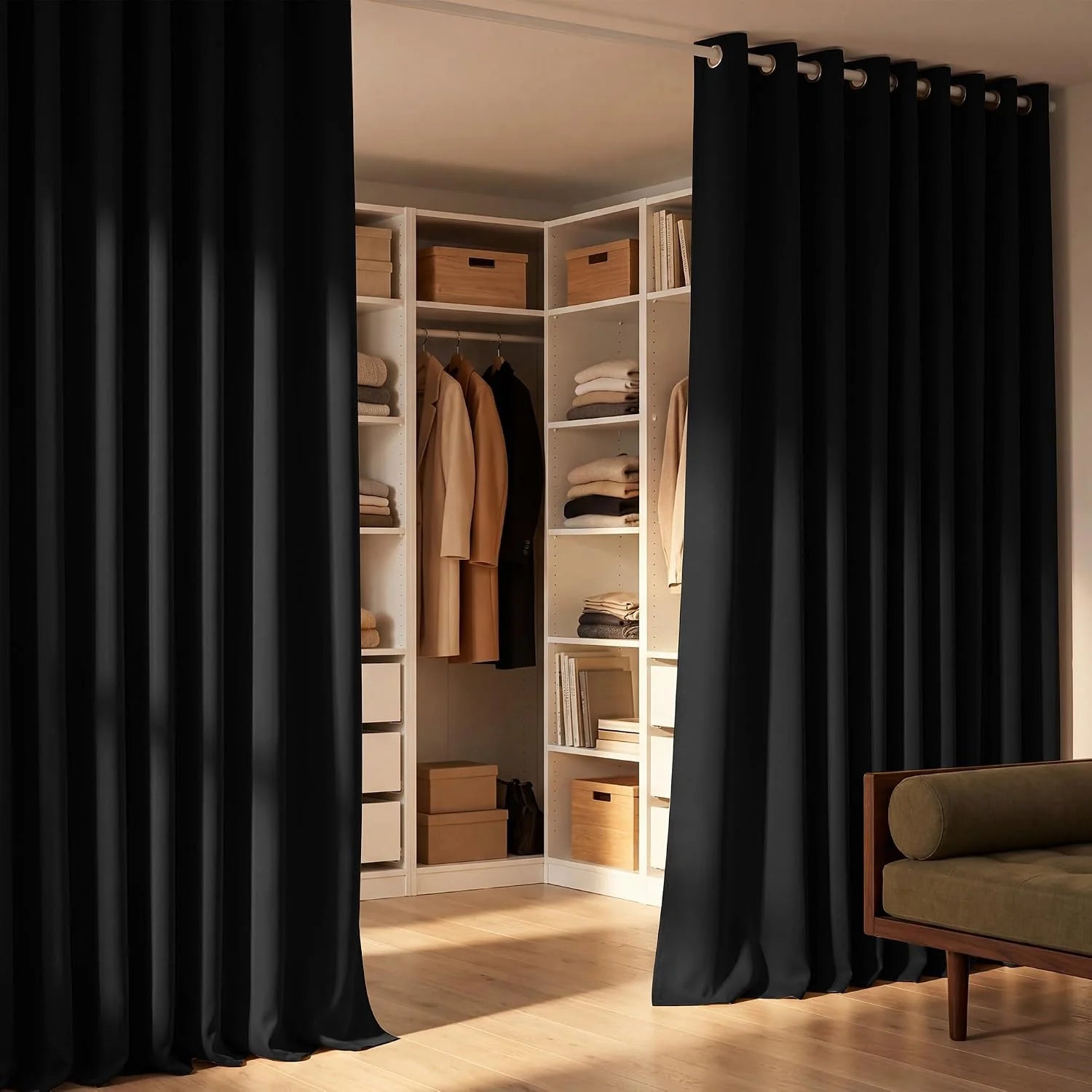 Black blackout grommet curtains acting as a room divider for an open closet system