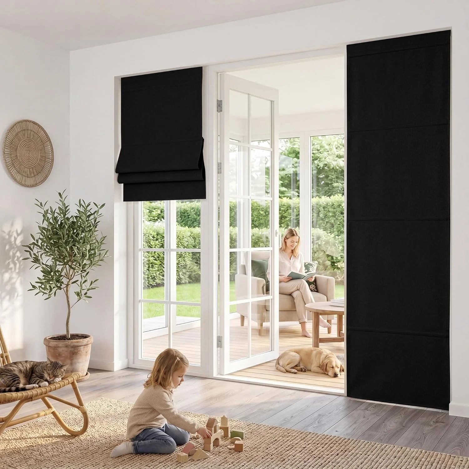 Black Roman and panel blinds on white French doors in a bright family living room with child and pet.