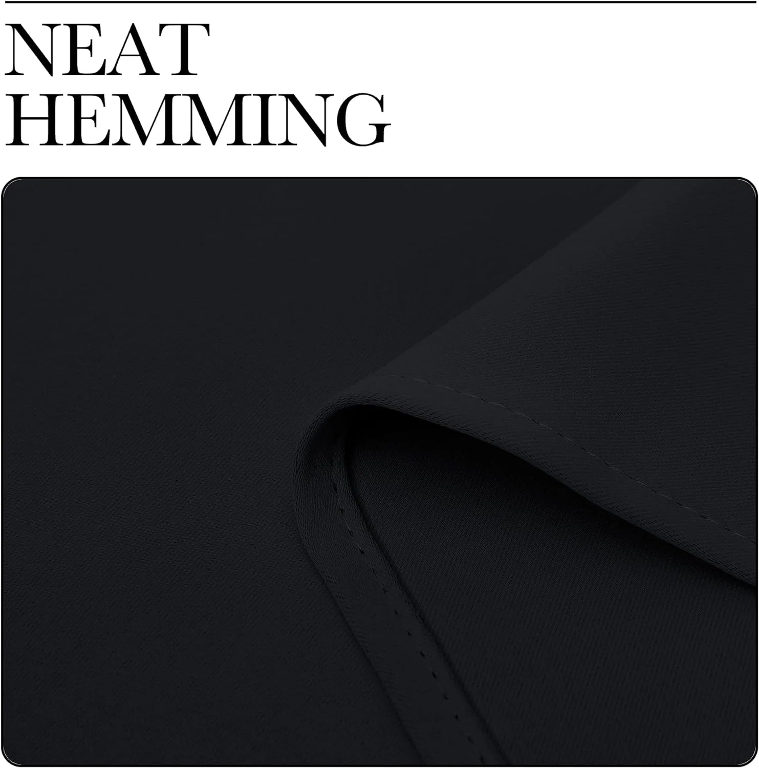 Close-up of black curtain fabric showing neat stitched hemming detail