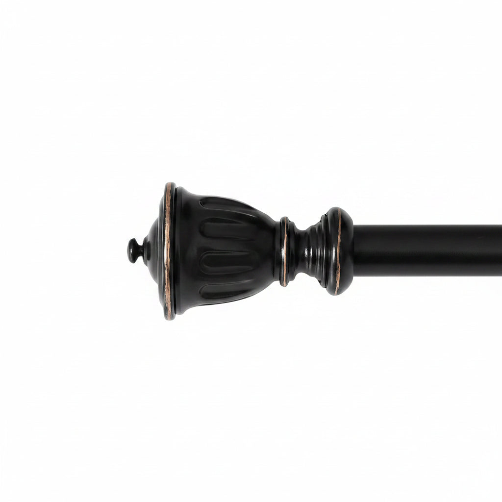 Black distressed curtain rod finial with carved wood detailing on white background