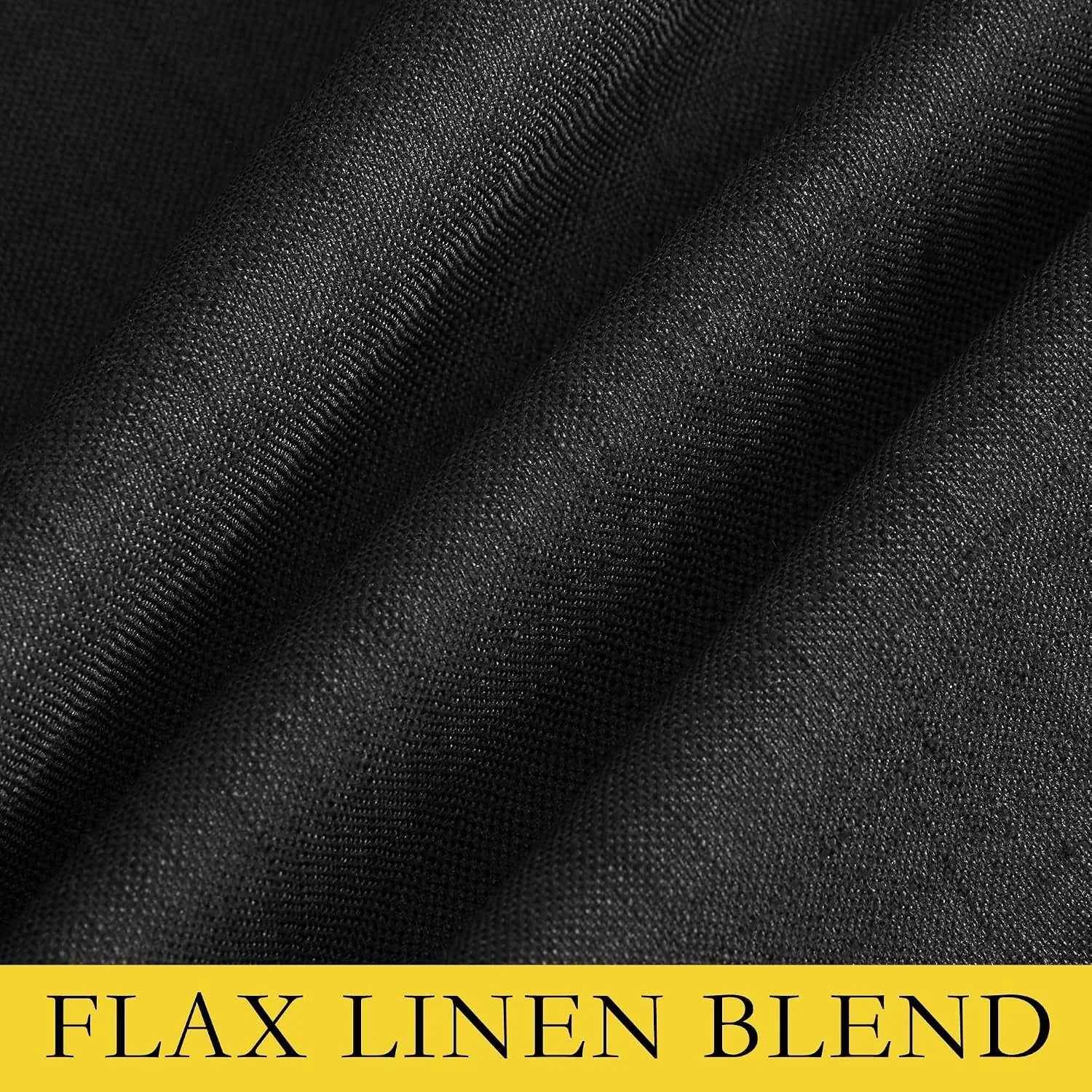 Close-up of black flax linen blend fabric with soft folds and woven texture