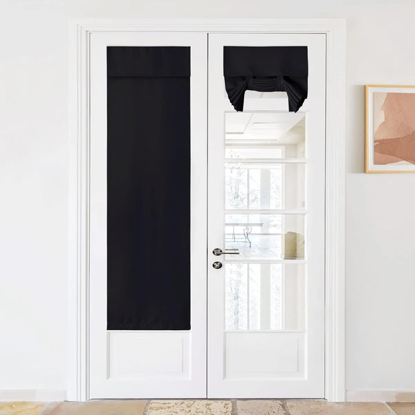 Black blackout fabric panel and a tied-up Roman shade installed on white French doors.