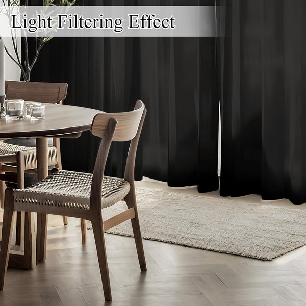 Black light filtering curtains in a modern dining room. Dark fabric, soft light.