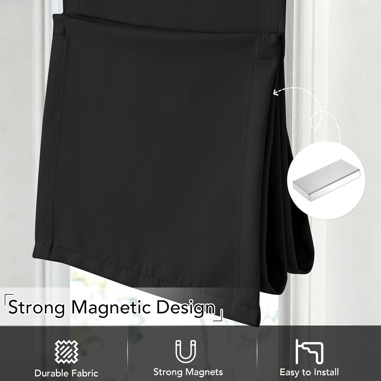 Black fabric curtain with strong magnetic design attached to window frame, highlighting easy installation.