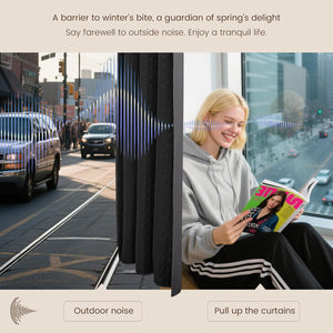 Black quilted noise-reducing curtain blocks city street sounds for a peaceful indoor space.