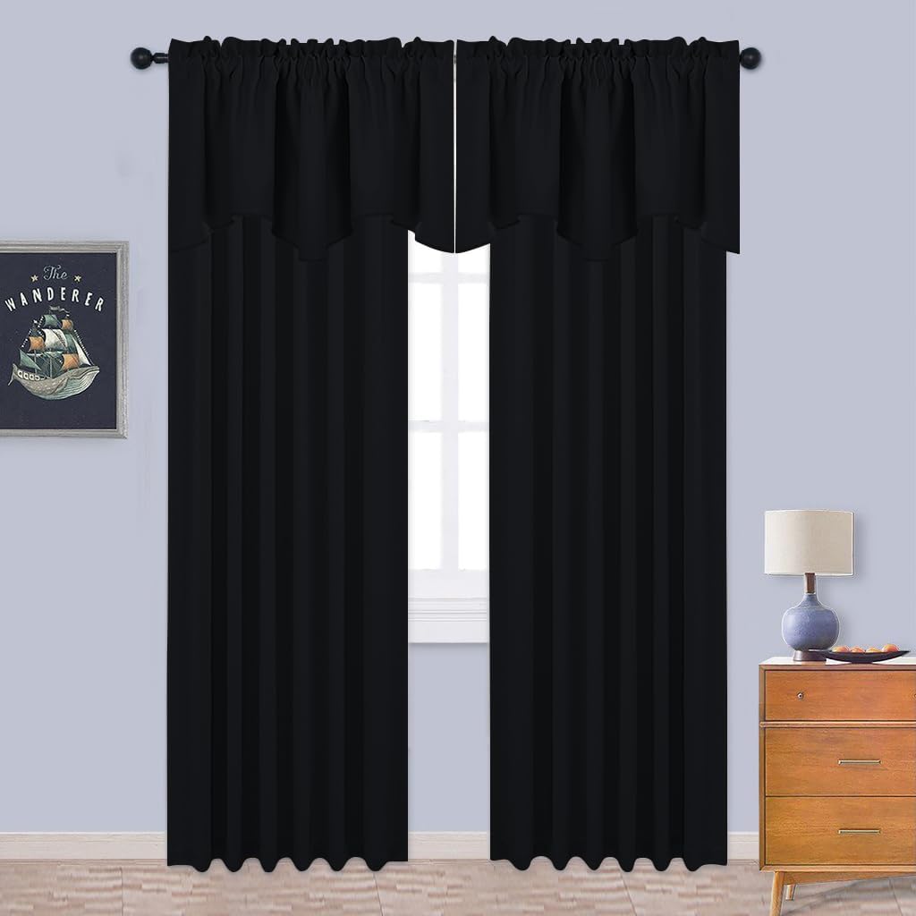 Pair of black ruffled rod pocket blackout curtains with layered valance over window