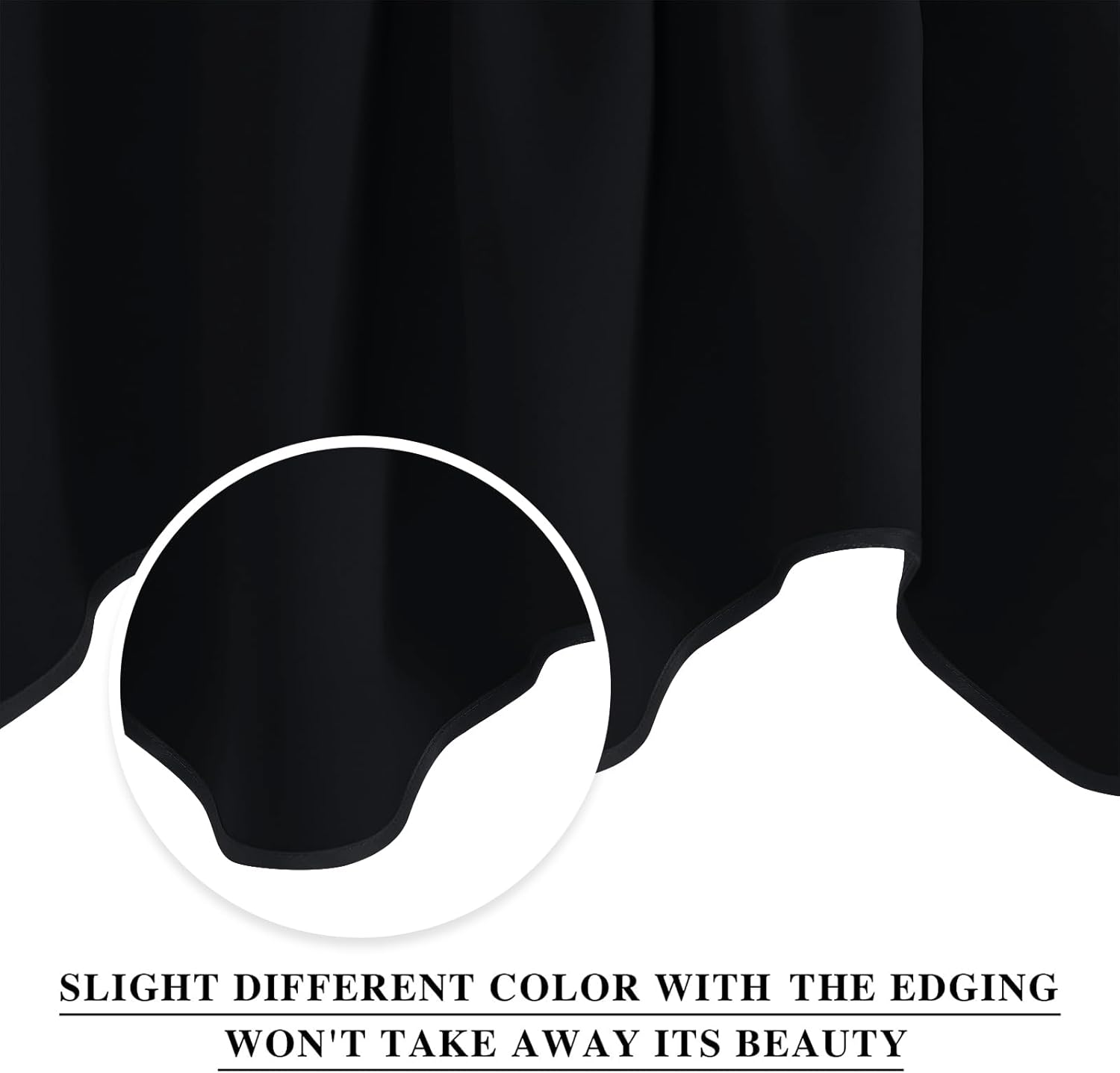 Close-up of a smooth black blackout curtain with a decorative scalloped bottom edge.