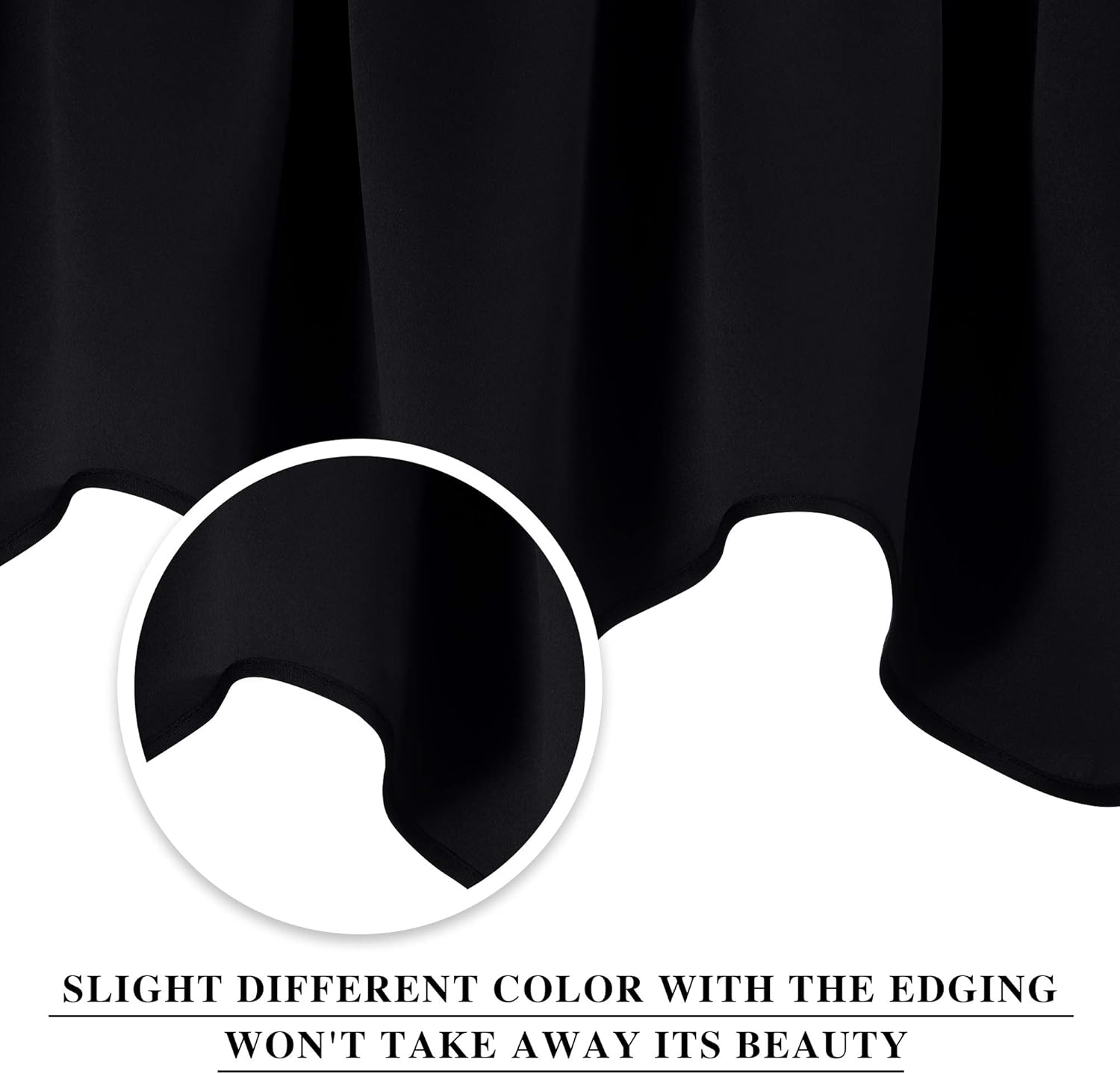 Close-up of black smooth fabric, likely a curtain or drape, showing its soft folds and neat hem detail.