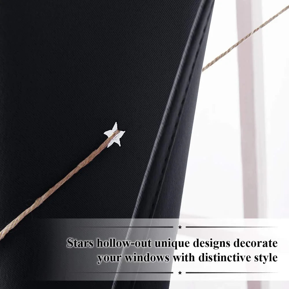 Black window curtain with star-shaped cutout detail and textured fabric close-up