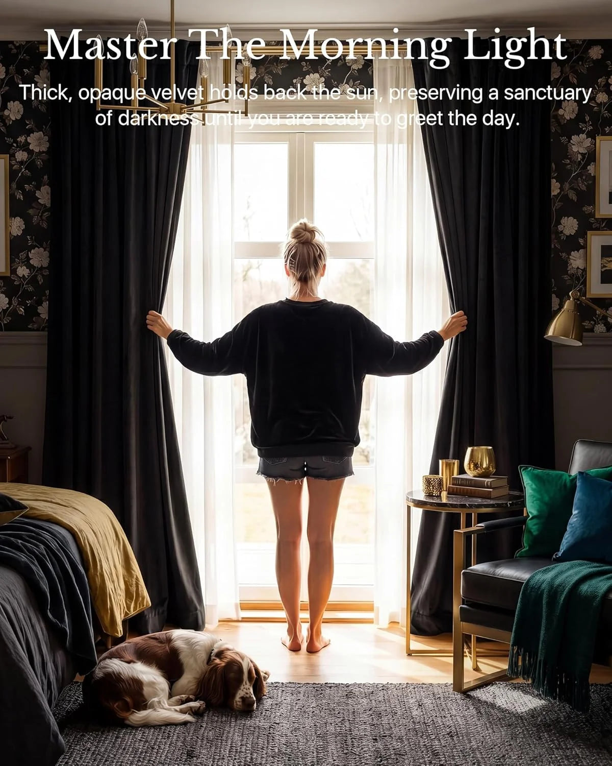 Woman opening black velvet blackout curtains over sheer panels in a moody bedroom
